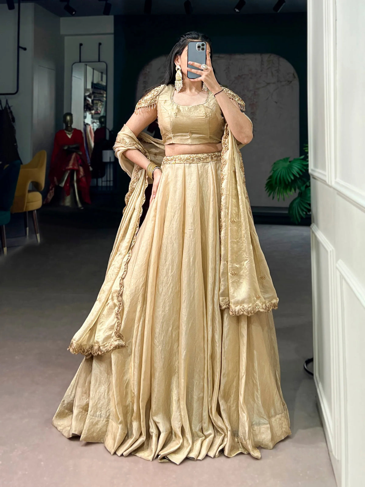 cream fendi lehenga set