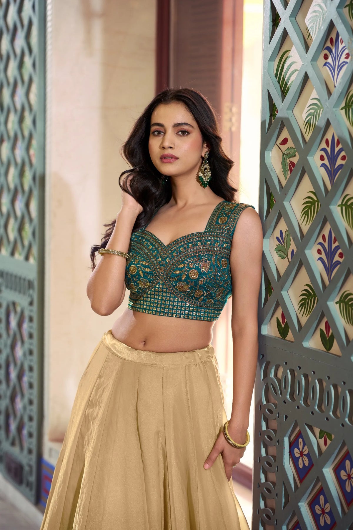 gold fendi lehenga set