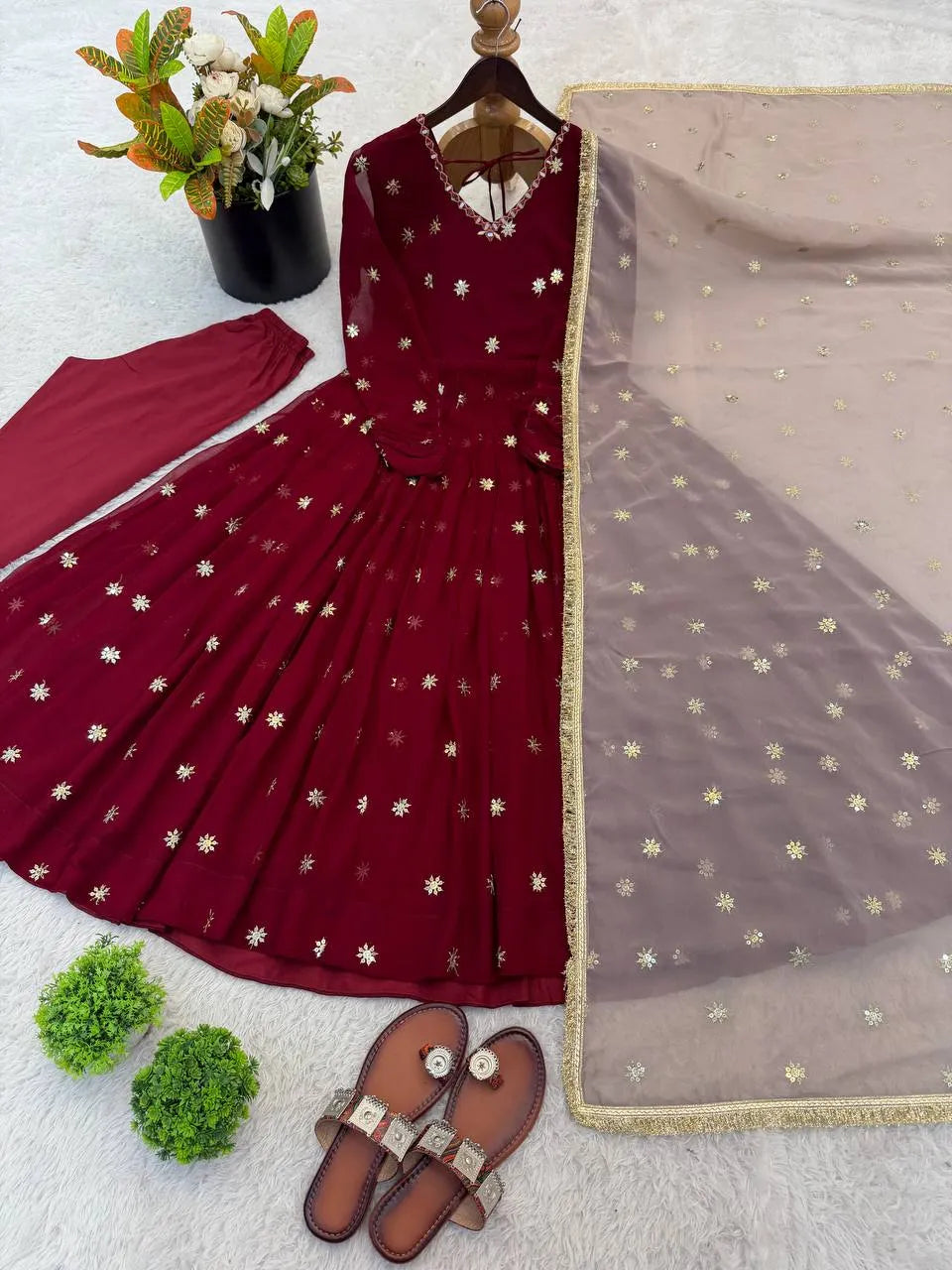 maroon embroidered gown