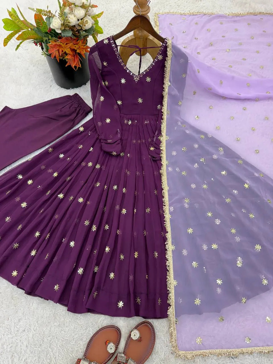 purple embroidered gown