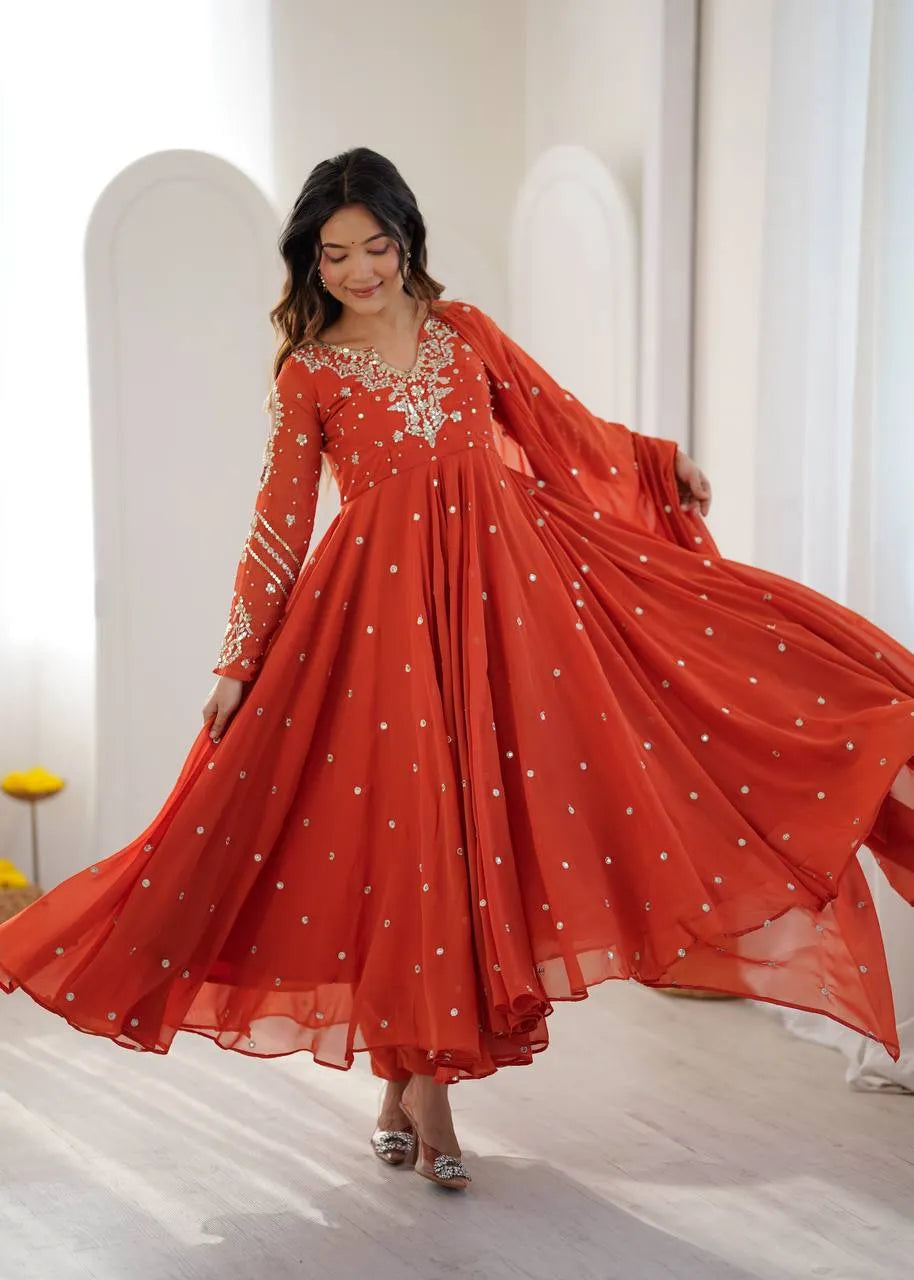 rust orange embroidered gown