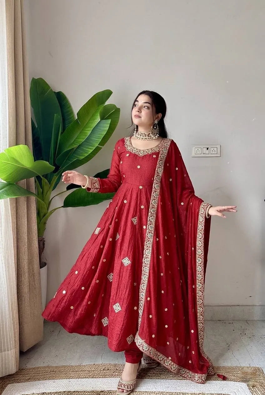 women maroon embroidered gown
